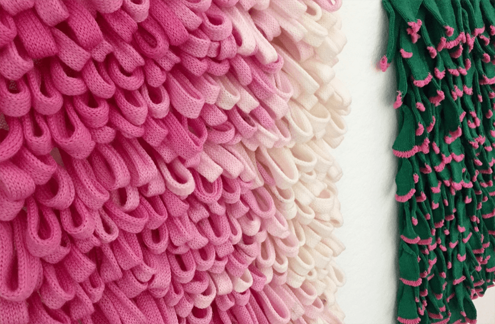 Fluffy knitted pink textiles