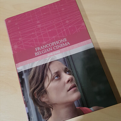 The book Francophone Belgian Cinema on a table