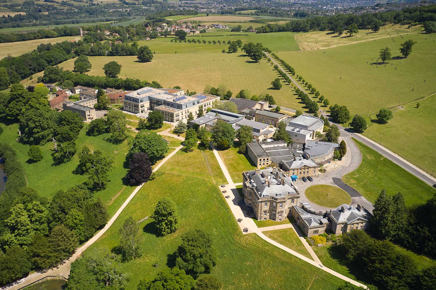 An aerial shot of Newton Park Campus on a clear, sunny day