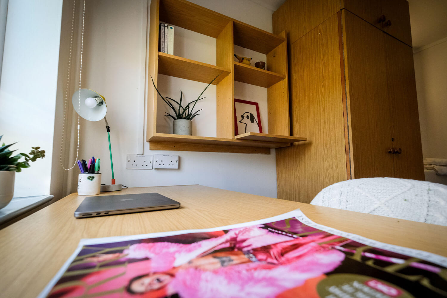 Wooden desk space in a student room