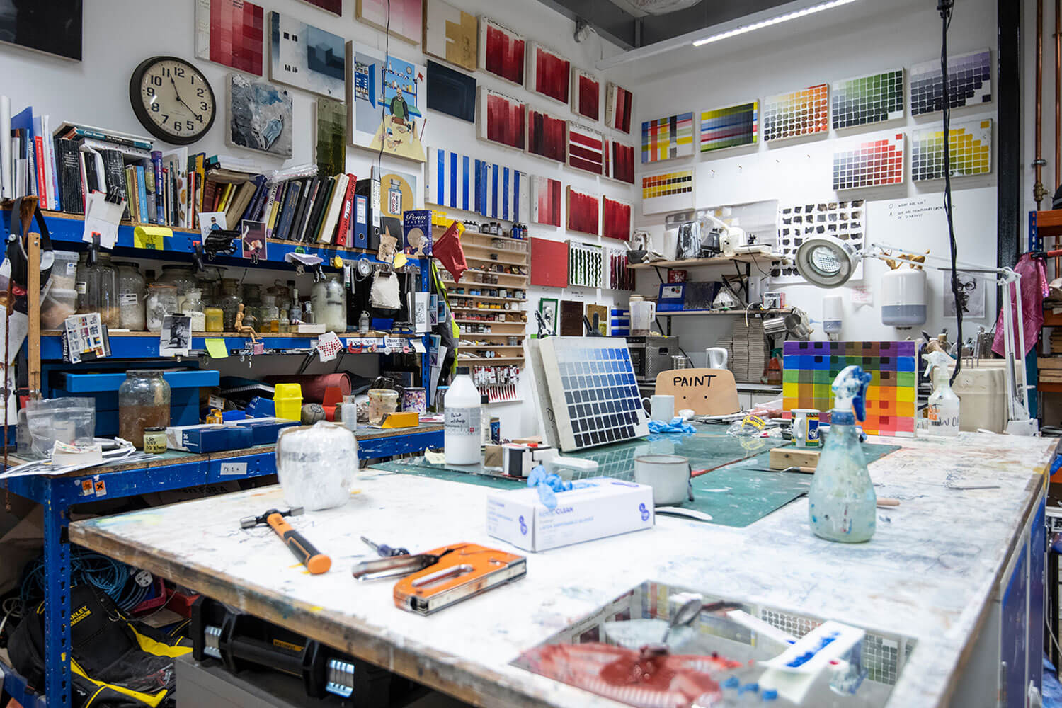 A room full of paints and painting tools