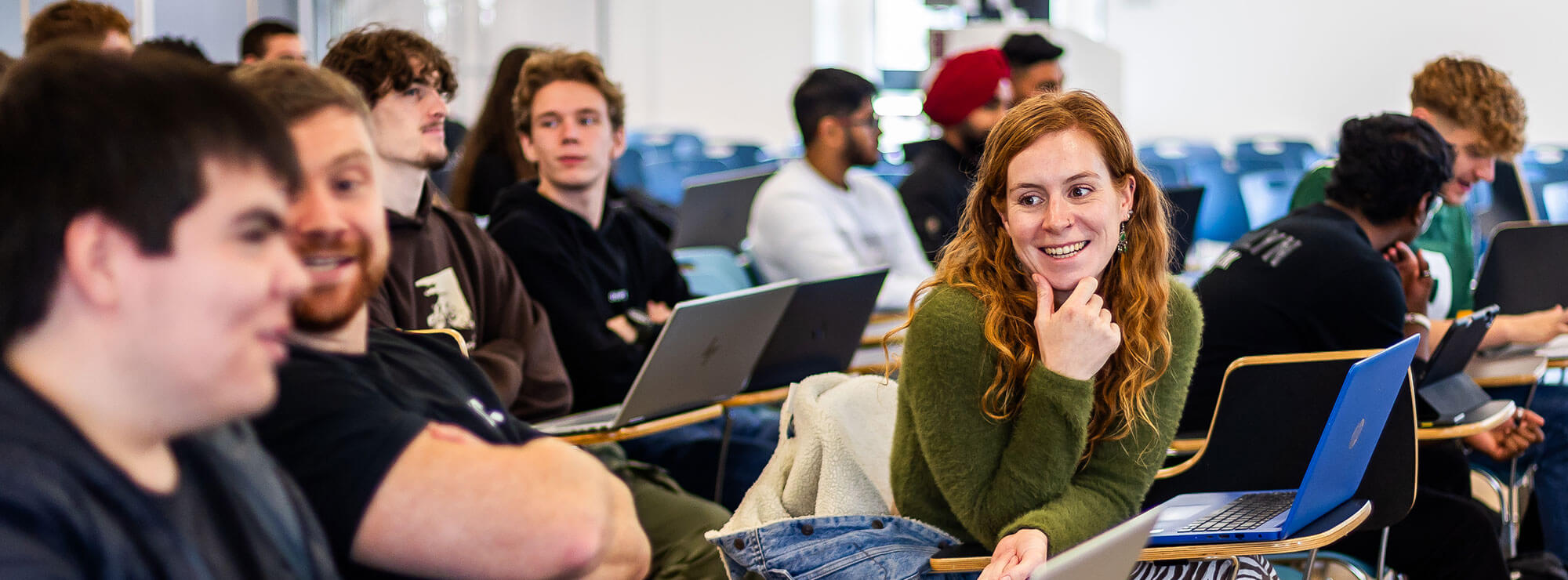 Students in a lecture hall at Newton Park Campus