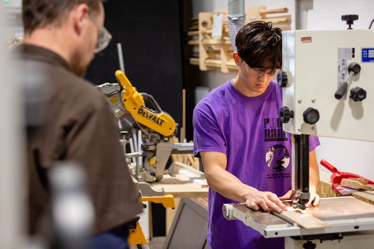 A student using tools in one of the workshops at Locksbrook campus