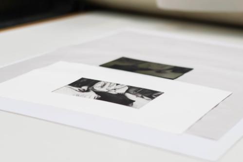 A photo of two photogravure prints created with an etching press