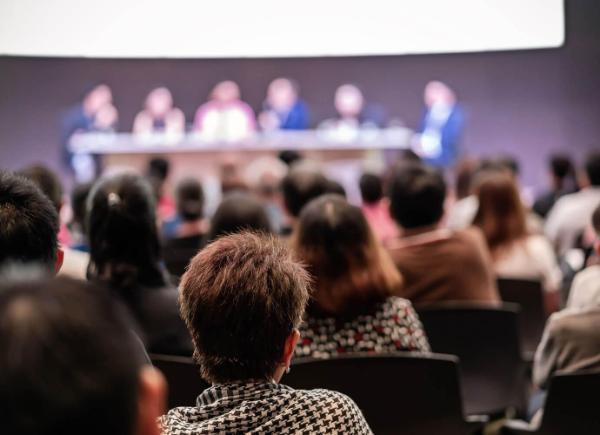 A room full of people at a conference