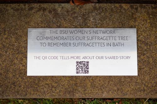 A silver plaque with an inscription to commemorate the Suffragette Tree at BSU