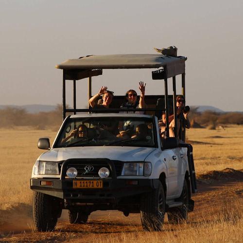 A truck with people riding in it