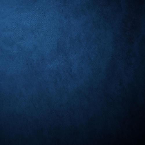 Blue textured background, ranging from mid blue to navy blue. 