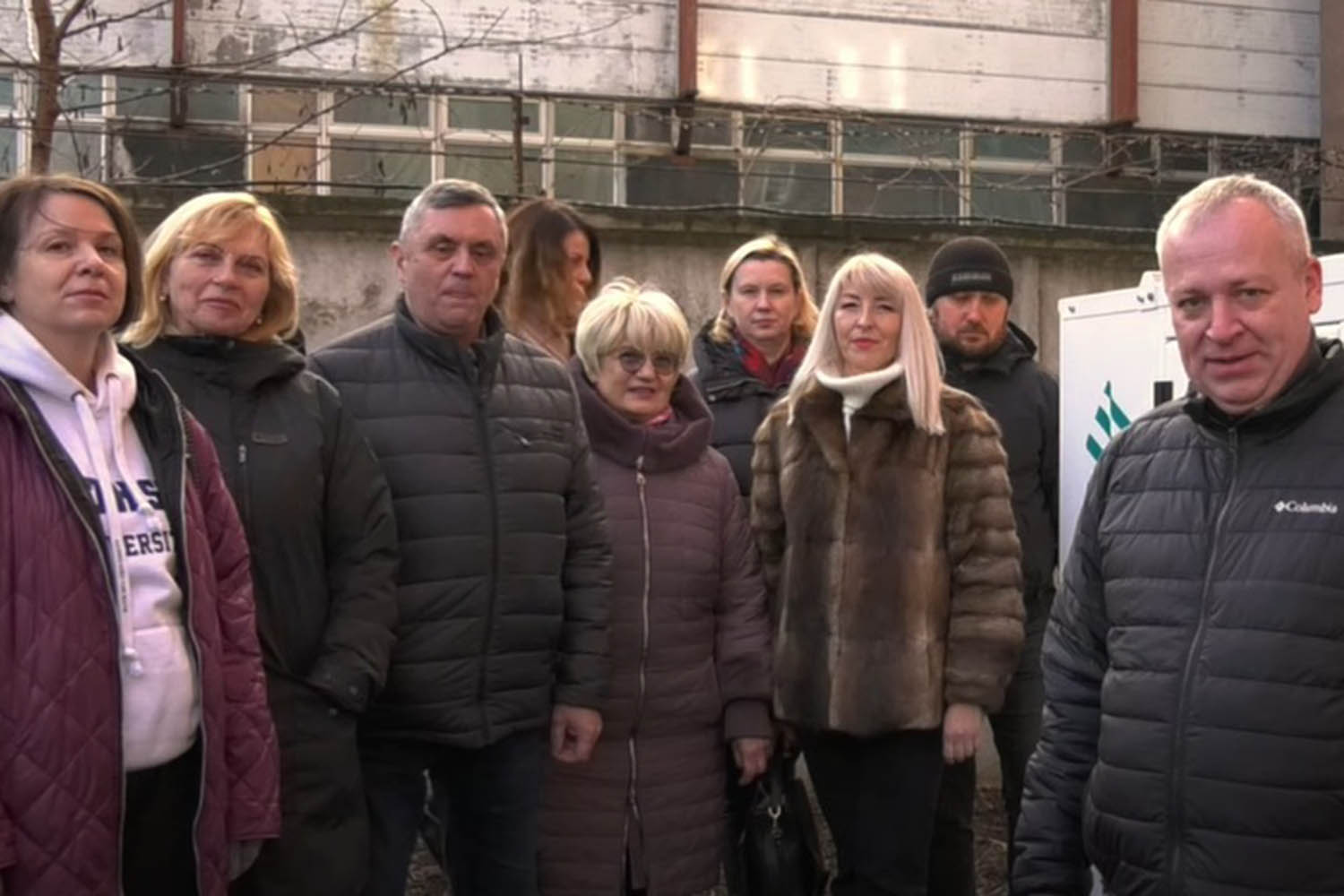 Colleagues from IUEH in Ukraine pose with a generator donated by BSU