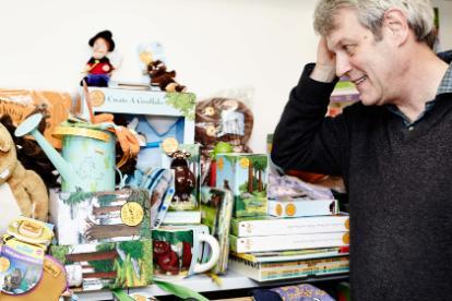 Alex sitting by Gruffalo merchandise