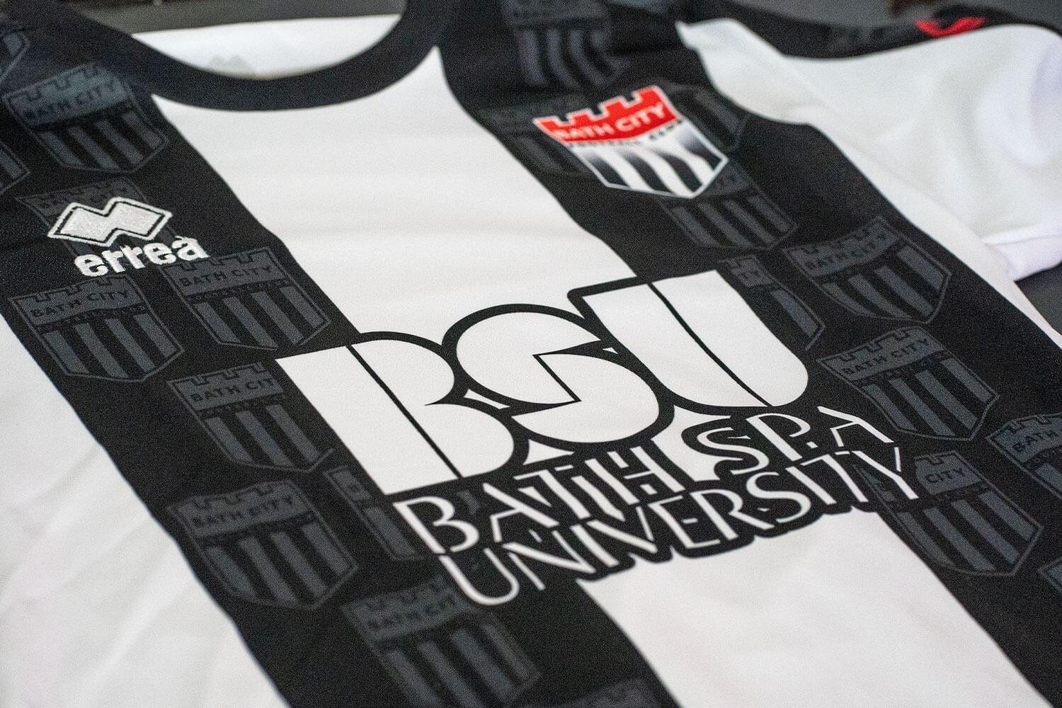 A close up picture of the new Bath City shirt, black and white striped, with the new BSU logo proudly displayed on the front
