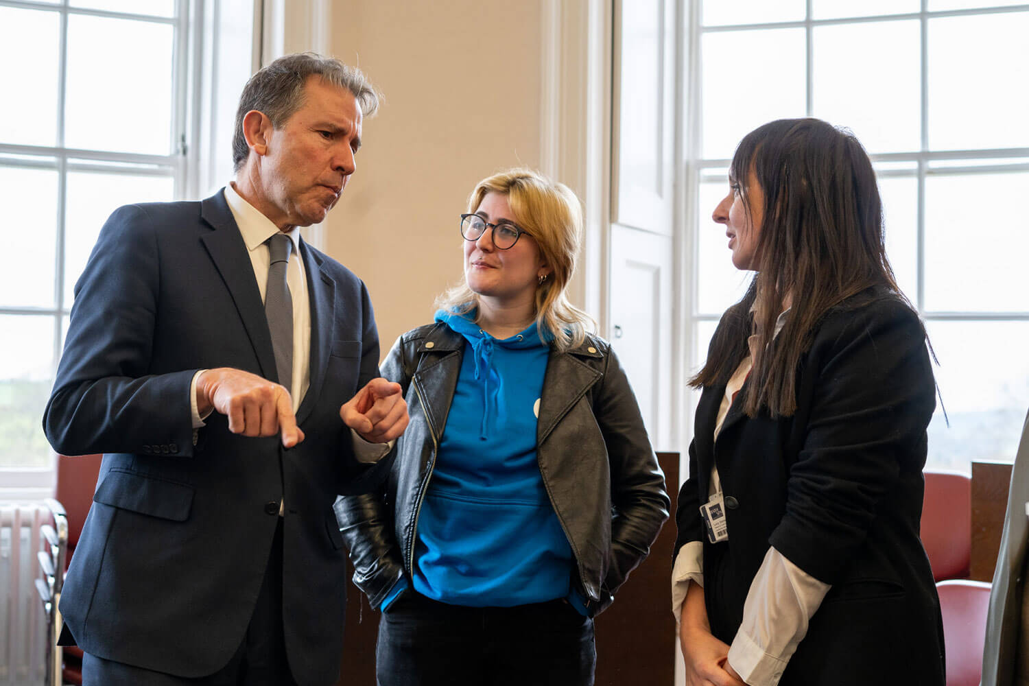 Labour MP Dan Norris speaking to two members of BSU staff