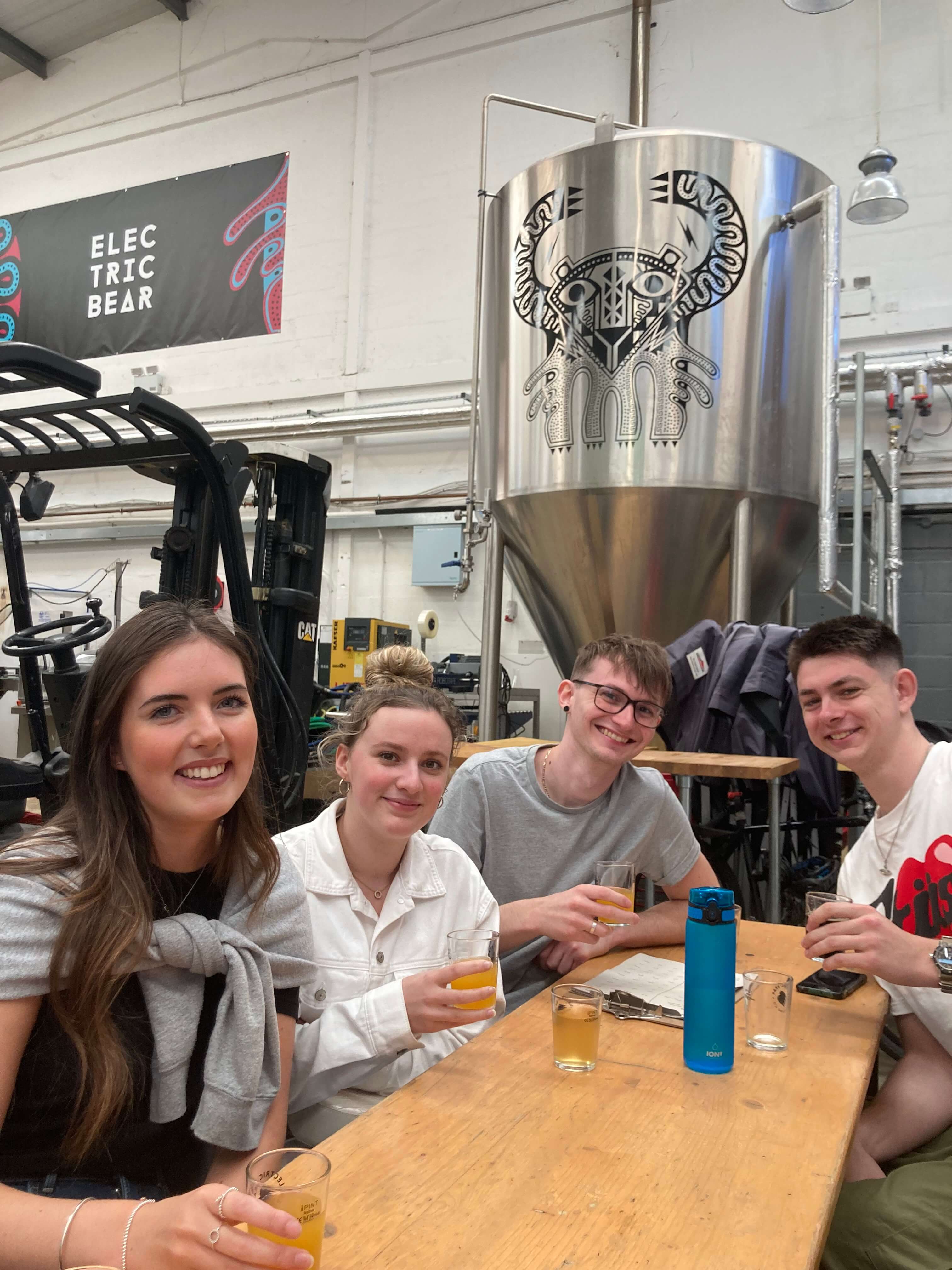 A group of Biology students on a field trip to Electric Bear brewery