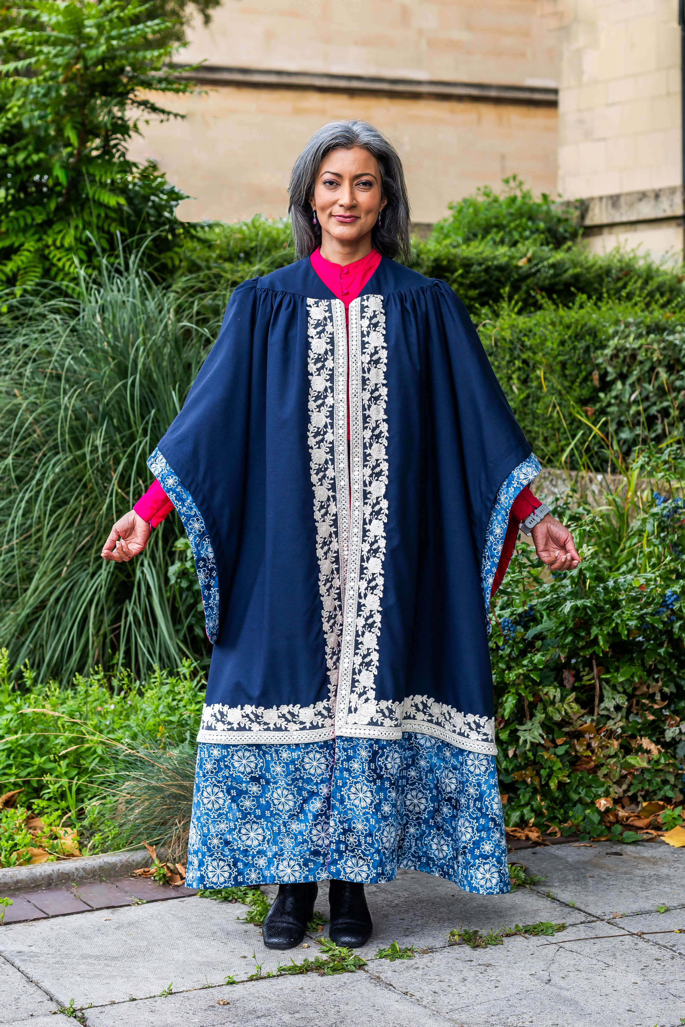 BSU Chancellor Sharanjit Leyl wearing her blue, red and light blue robes