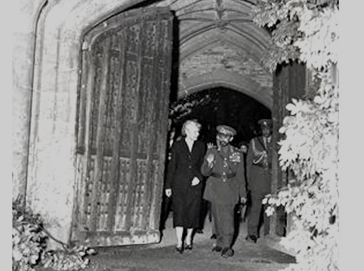 A black and white image of a man and a women on Newton Park campus