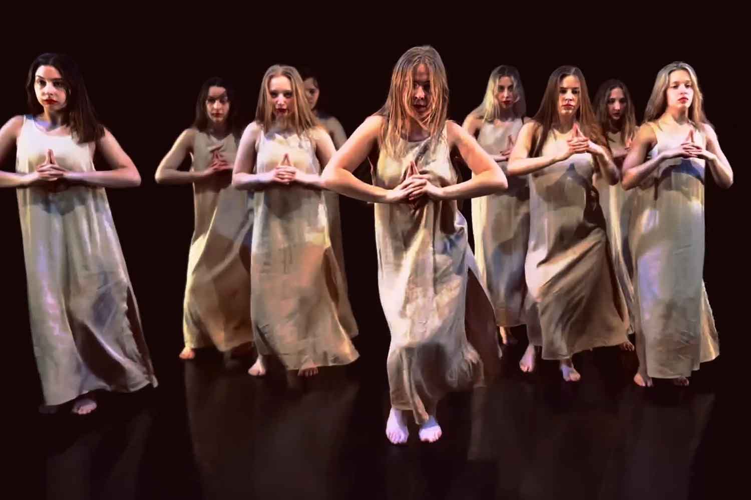 still of dance students in row in white dresses