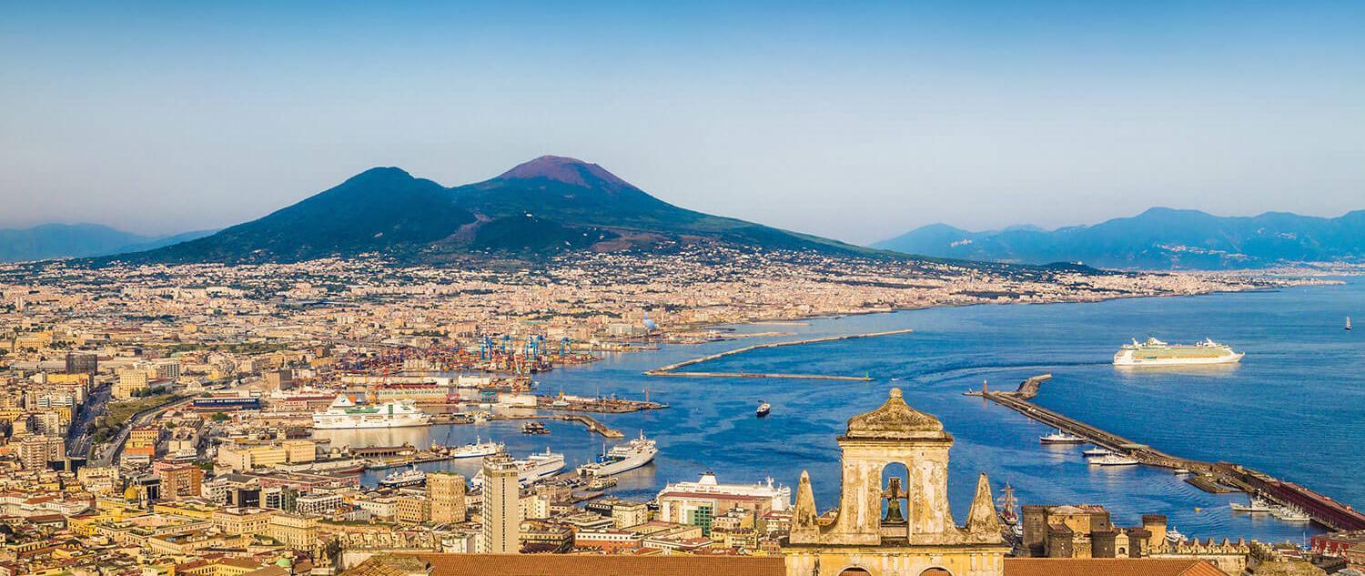 Aerial view of Naples with Mount Vesuvius at sunset