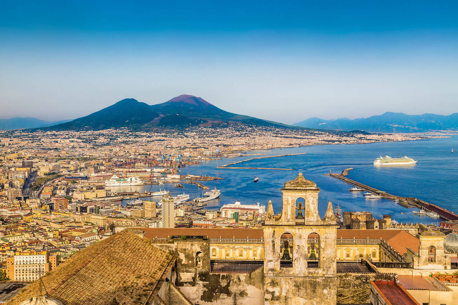 Aerial view of Naples with Mount Vesuvius at sunset