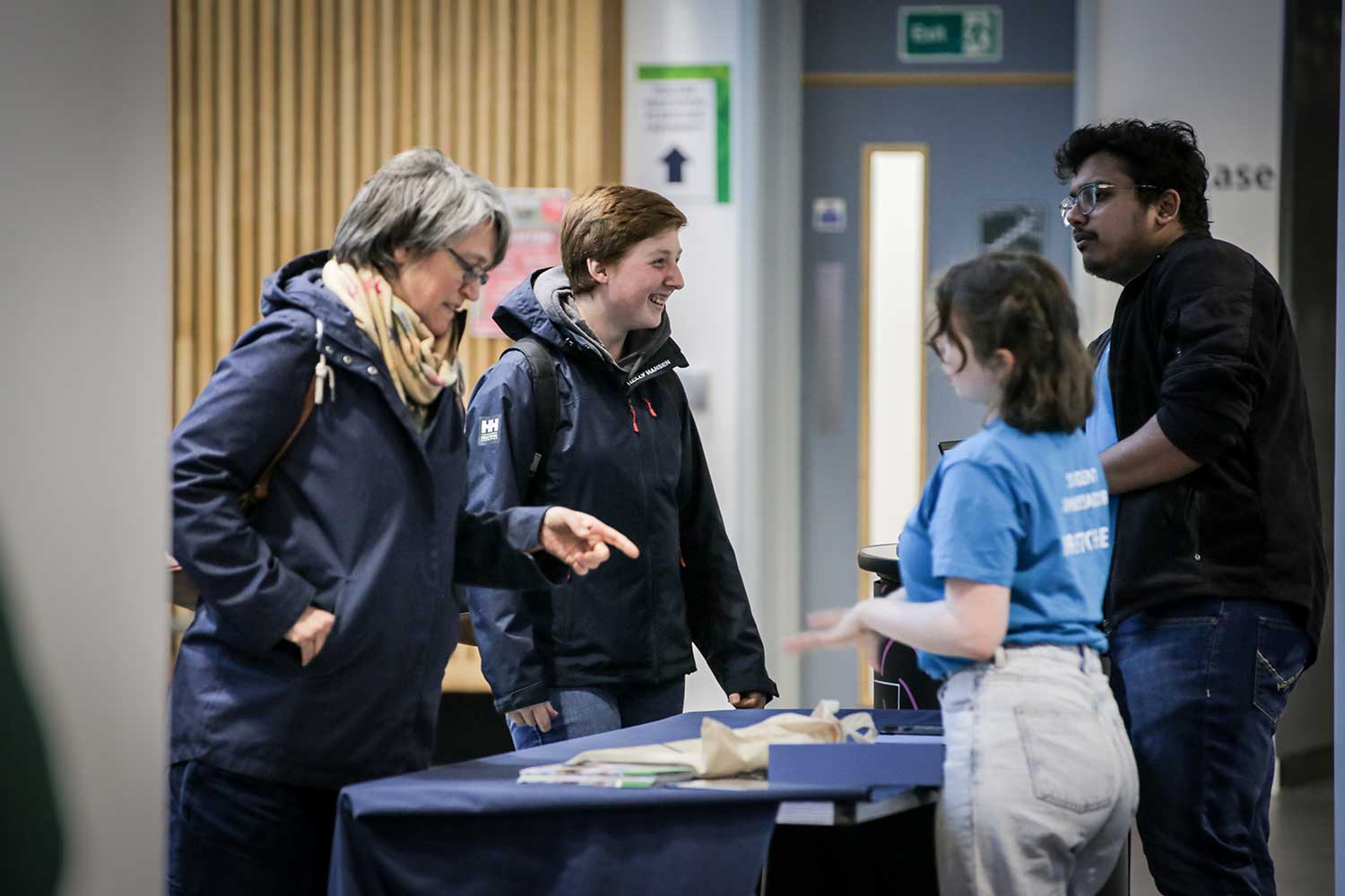 Student Ambassadors greet visitors in the Commons Atrium