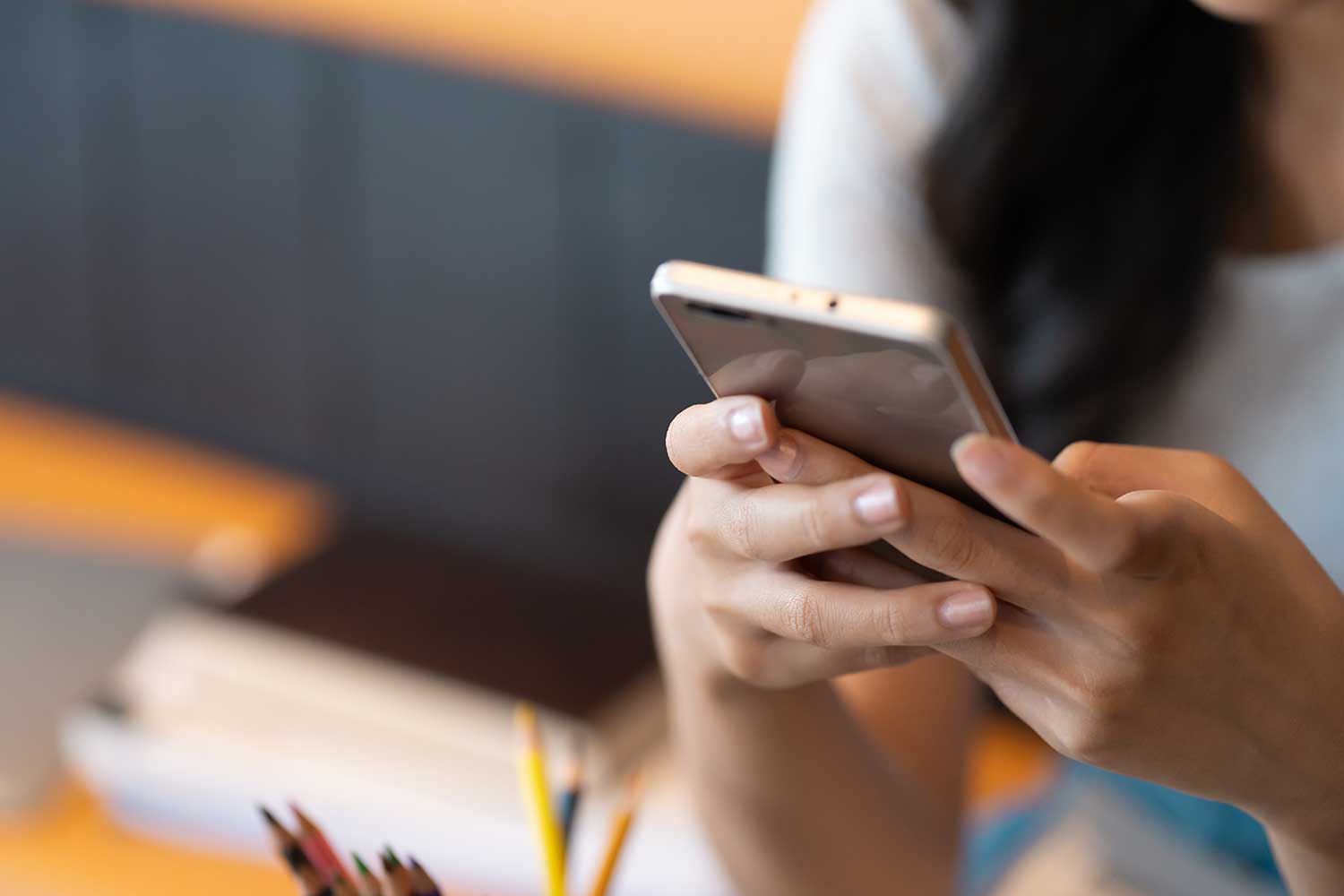 A close-up shot of someone holding a smartphone