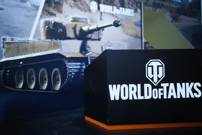 A large sign that says 'World of Tanks' next to an image of a tank.